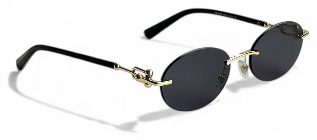 عینک آفتابی زنانه REN EYEWEAR فلزی بیضی مشکی با جزئیات طلایی UV400 مدل DERLA عینک آفتابی زنانه REN EYEWEAR فلزی بیضی مشکی با جزئیات طلایی UV400 مدل DERLA