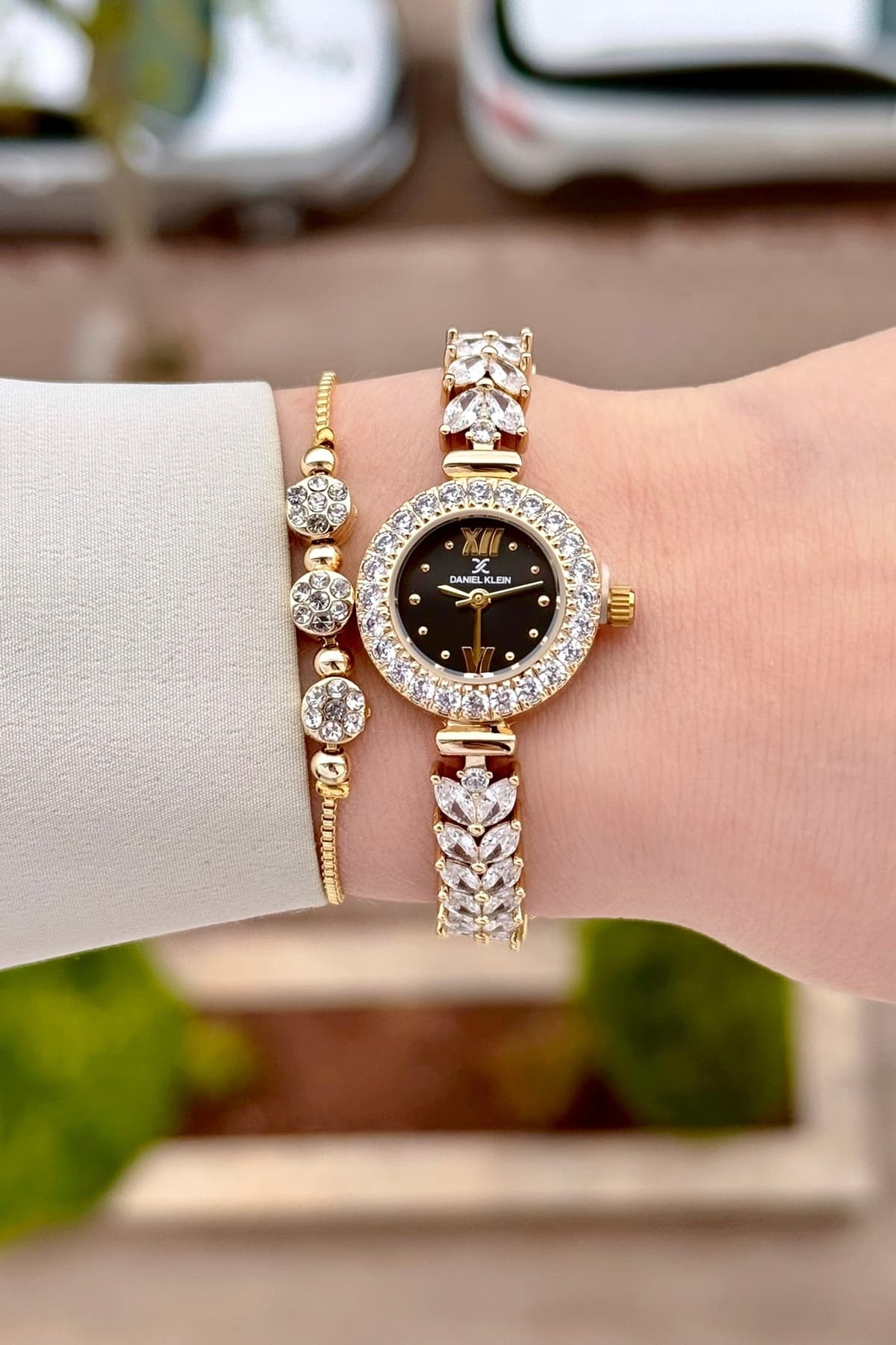 ساعت مچی زنانه Daniel Klein صفحه مشکی بند مشکی طلایی 22,5 mm مدل عروس ساعت مچی زنانه Daniel Klein صفحه مشکی بند مشکی طلایی 22,5 mm مدل عروس