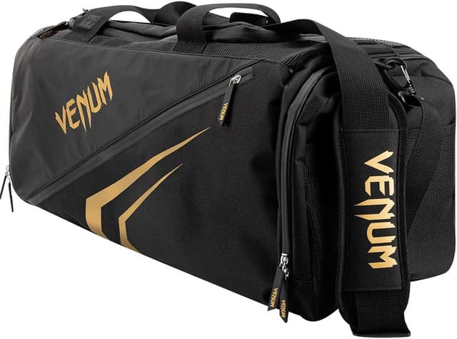 کیف ورزشی یونیسکس بزرگسال Venum Trainer Lite Evo تکسایز مشکی/طلایی کیف ورزشی یونیسکس بزرگسال Venum Trainer Lite Evo تکسایز مشکی/طلایی