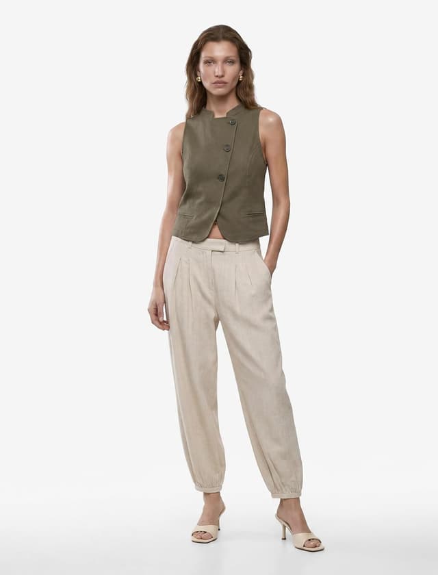 جلیقه زنانه Koton Slim Fit یقه مندارین دکمهدار نامتقارن کتان جلیقه زنانه Koton Slim Fit یقه مندارین دکمهدار نامتقارن کتان