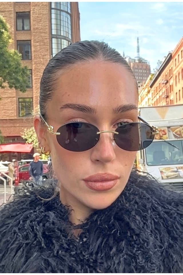 عینک آفتابی زنانه REN EYEWEAR فلزی بیضی مشکی با جزئیات طلایی UV400 مدل DERLA عینک آفتابی زنانه REN EYEWEAR فلزی بیضی مشکی با جزئیات طلایی UV400 مدل DERLA
