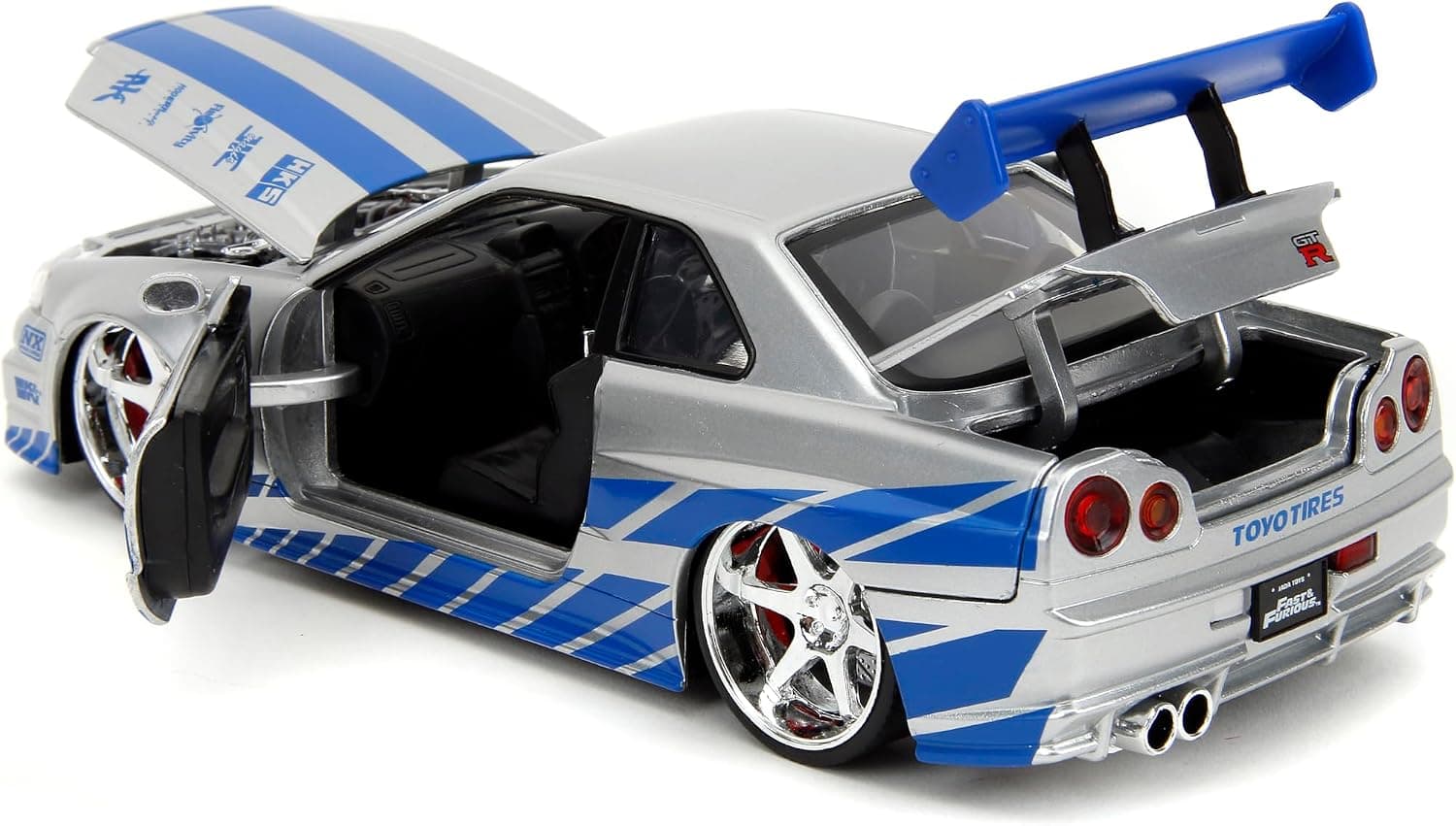 ماشین فلزی Jada از مجموعه Fast & Furious مدل 2002 Nissan Skyline R34، مقیاس 1:24، نقرهای و آبی ماشین فلزی Jada از مجموعه Fast & Furious مدل 2002 Nissan Skyline R34، مقیاس 1:24، نقرهای و آبی