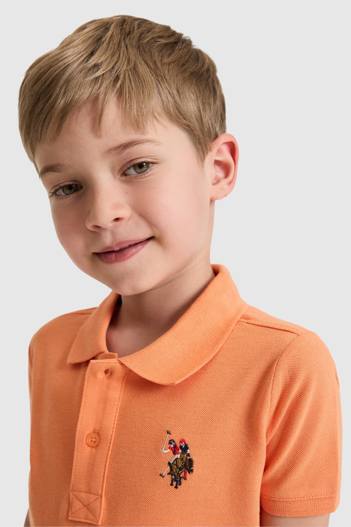 تیشرت پسرانه یقه پولو U.S. Polo Assn. نارنجی ساده مدل 50325608-VR051 تیشرت پسرانه یقه پولو U.S. Polo Assn. نارنجی ساده مدل 50325608-VR051