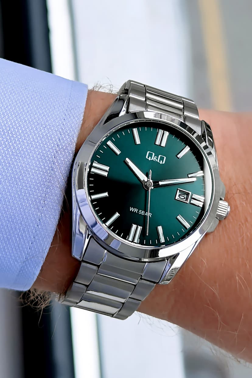 ساعت مردانه Q&Q کوارتز بند فولادی نقرهای ضد آب 5 ATM مدل QQE2001C18 ساعت مردانه Q&Q کوارتز بند فولادی نقرهای ضد آب 5 ATM مدل QQE2001C18