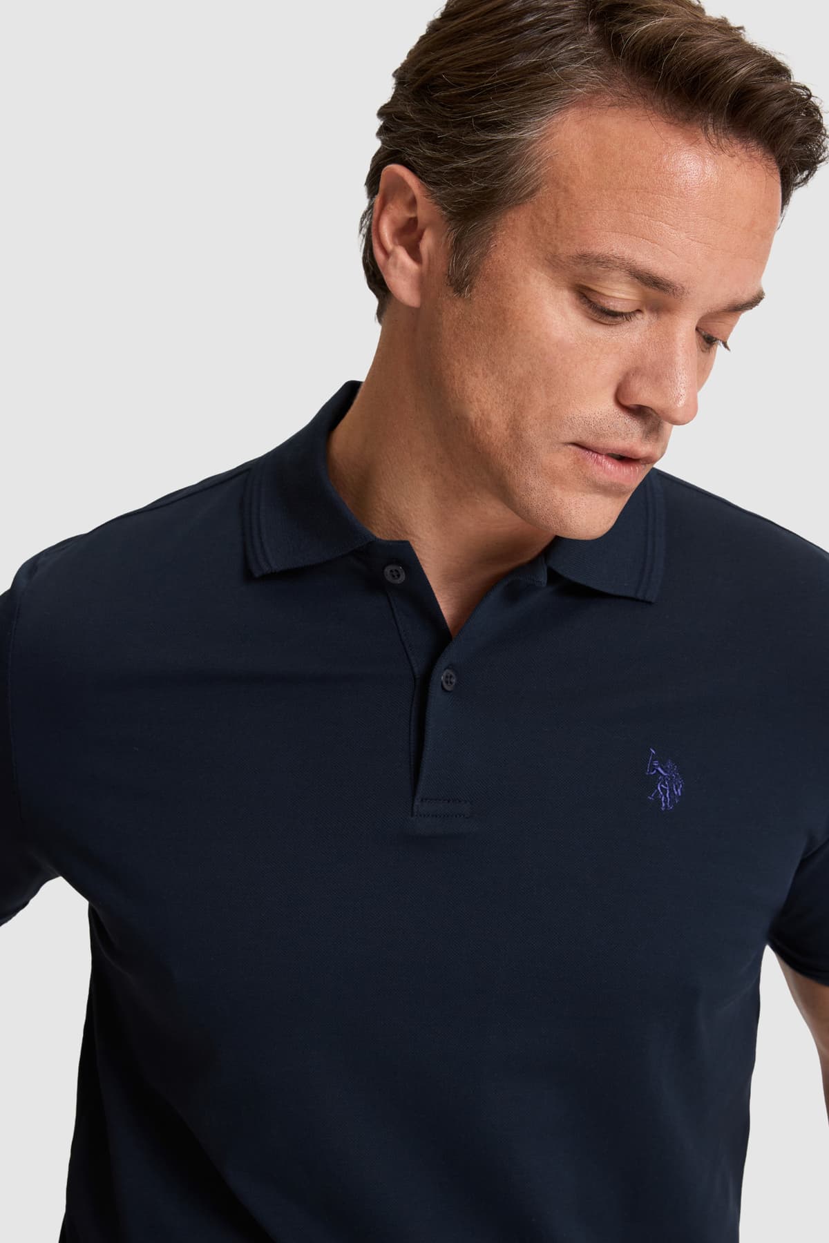 تیشرت مردانه U.S. Polo Assn. سرمهای تیره فیت معمولی یقه پولو مدل 50324938-VR100 تیشرت مردانه U.S. Polo Assn. سرمهای تیره فیت معمولی یقه پولو مدل 50324938-VR100
