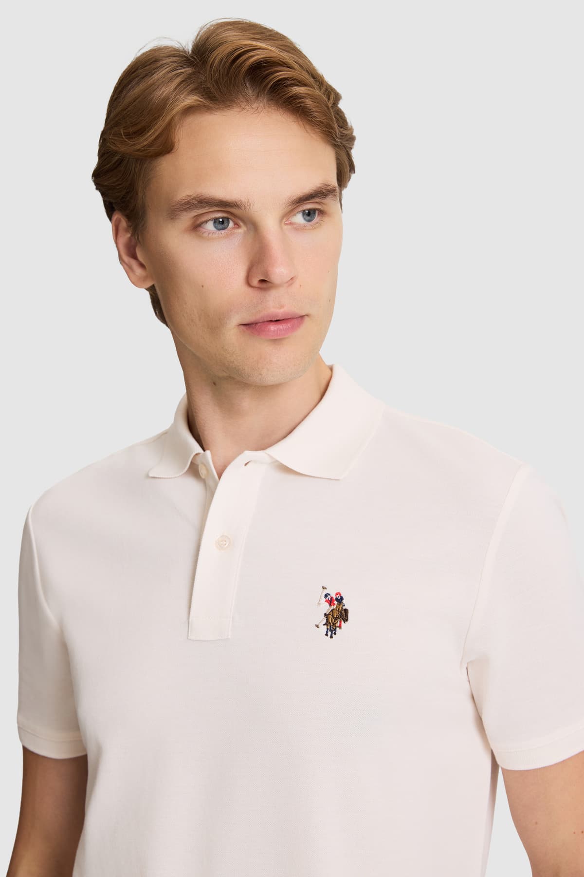 تیشرت مردانه یقه پولو U.S. Polo Assn. کرم ساده با فیت معمولی مدل 50326972-VR071 تیشرت مردانه یقه پولو U.S. Polo Assn. کرم ساده با فیت معمولی مدل 50326972-VR071