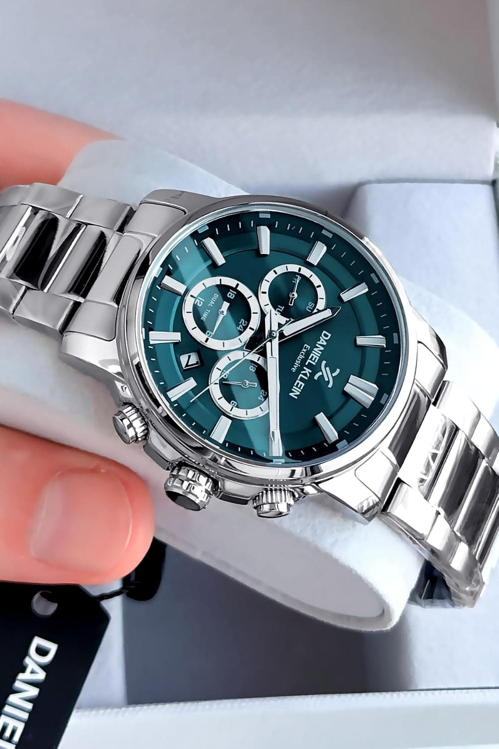 ساعت مردانه Daniel Klein ضدآب 3 ATM بند فولادی نقرهای پترولی مدل DKE2051C5 ساعت مردانه Daniel Klein ضدآب 3 ATM بند فولادی نقرهای پترولی مدل DKE2051C5