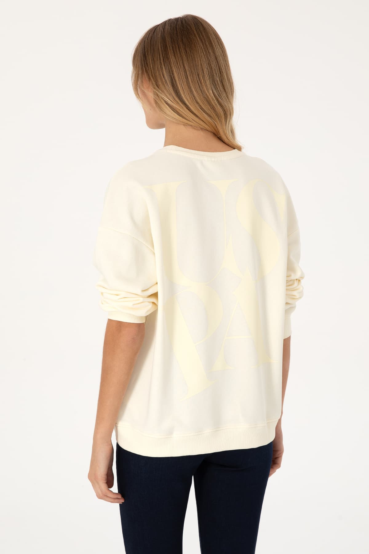 سوئیشرت زنانه U.S. Polo Assn. کرمی یقه گرد مدل 50307787-VR256 سوئیشرت زنانه U.S. Polo Assn. کرمی یقه گرد مدل 50307787-VR256