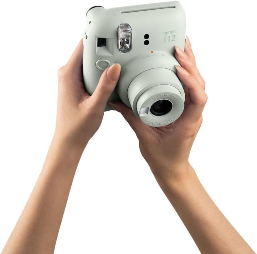 دوربین فوری instax Fujifilm سبز نعنایی با بسته فیلم 40 شاتی مدل Mini 12 دوربین فوری instax Fujifilm سبز نعنایی با بسته فیلم 40 شاتی مدل Mini 12