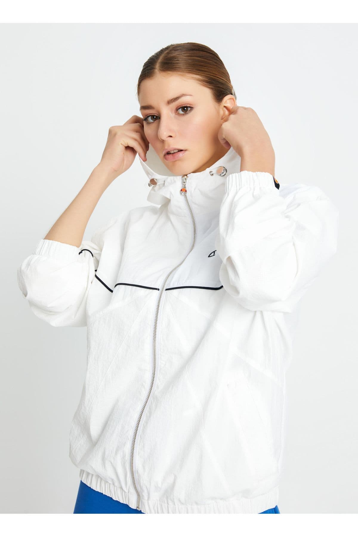 بادگیر زنانه Ellesse سفید شکسته مدل EF100-OF بادگیر زنانه Ellesse سفید شکسته مدل EF100-OF