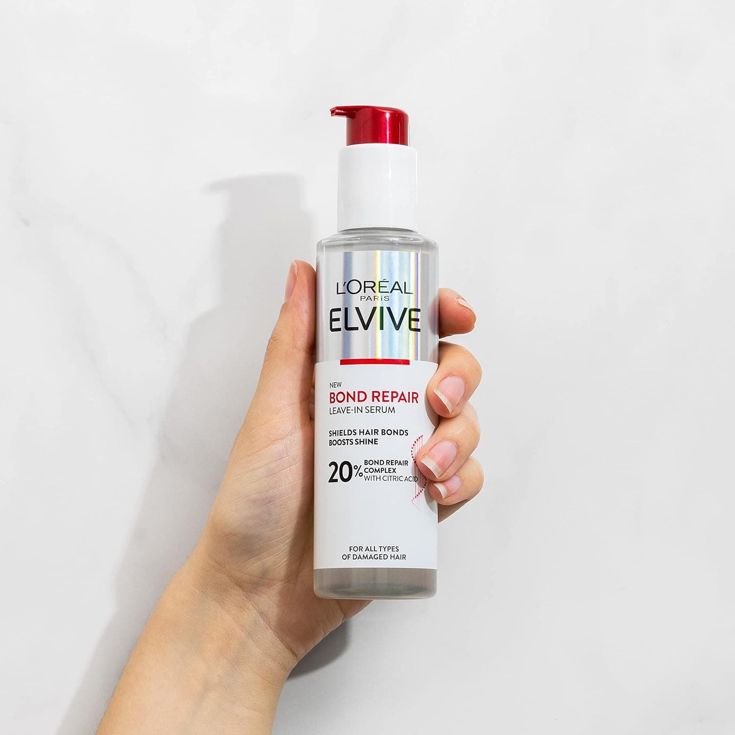 سرم مو بدون آبکشی L'Oréal Paris Elvive ترمیمکننده پیوند 150 ml سرم مو بدون آبکشی L'Oréal Paris Elvive ترمیمکننده پیوند 150 ml