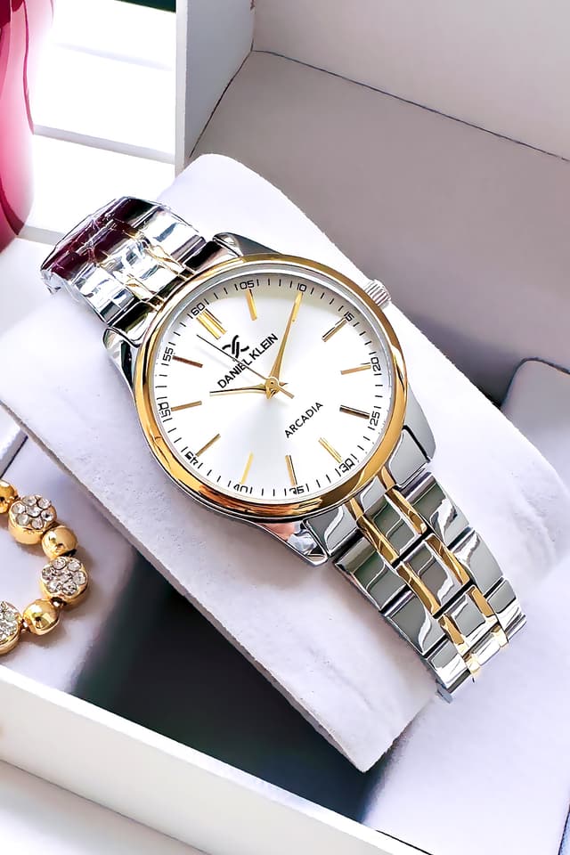 ساعت مچی زنانه Daniel Klein مقاوم در برابر آب 3 ATM بند فولادی رنگ طلایی و نقرهای مدل DKBY2010C2 ساعت مچی زنانه Daniel Klein مقاوم در برابر آب 3 ATM بند فولادی رنگ طلایی و نقرهای مدل DKBY2010C2