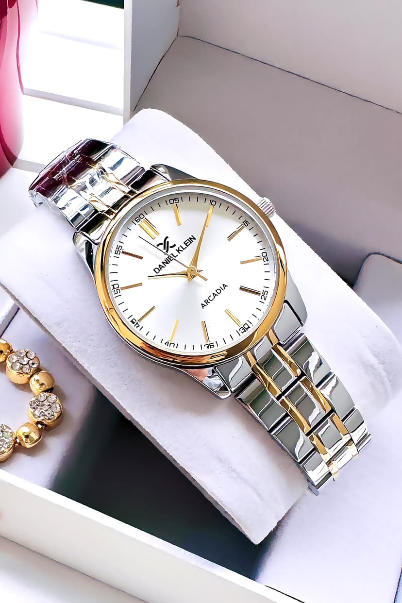 ساعت مچی زنانه Daniel Klein مقاوم در برابر آب 3 ATM بند فولادی رنگ طلایی و نقرهای مدل DKBY2010C2 ساعت مچی زنانه Daniel Klein مقاوم در برابر آب 3 ATM بند فولادی رنگ طلایی و نقرهای مدل DKBY2010C2