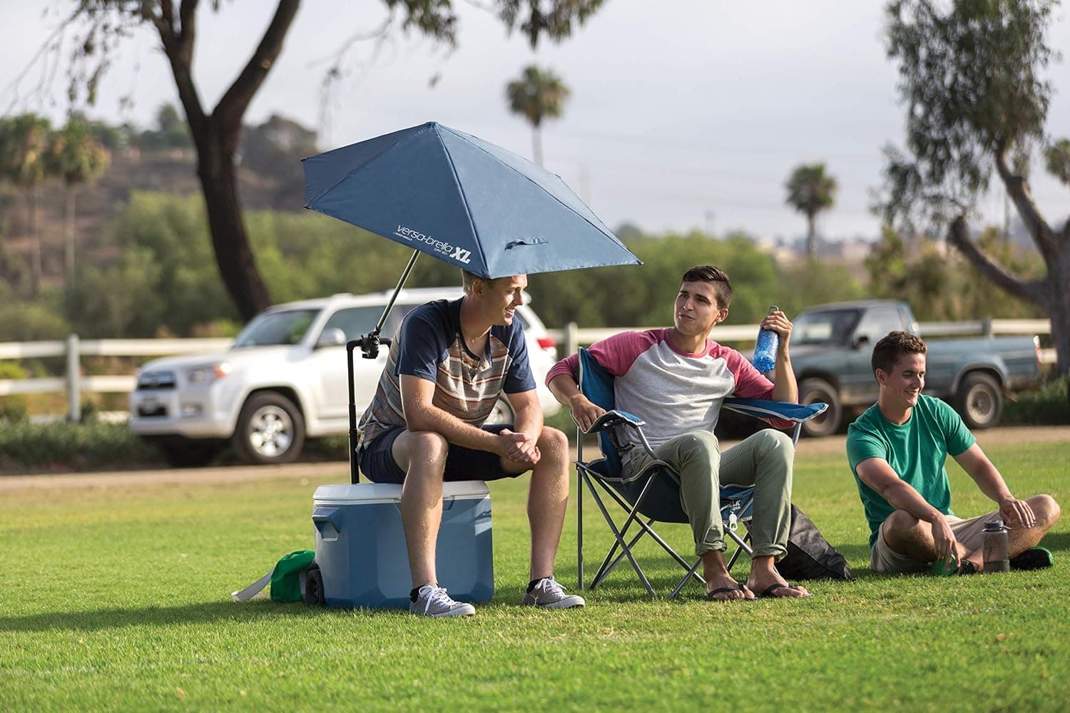 چتر قابل تنظیم Sport-Brella Versa-Brella با SPF 50+ و گیره یونیورسال XL قرمز آجر نسوز چتر قابل تنظیم Sport-Brella Versa-Brella با SPF 50+ و گیره یونیورسال XL قرمز آجر نسوز