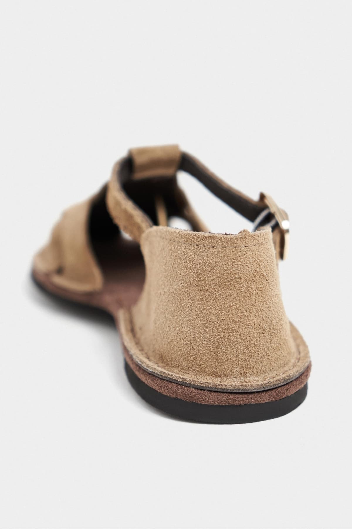 صندل زنانه NİŞANTAŞI SHOES Solto Rome چرمی بژ با جزئیات سگک و کفی تخت صندل زنانه NİŞANTAŞI SHOES Solto Rome چرمی بژ با جزئیات سگک و کفی تخت