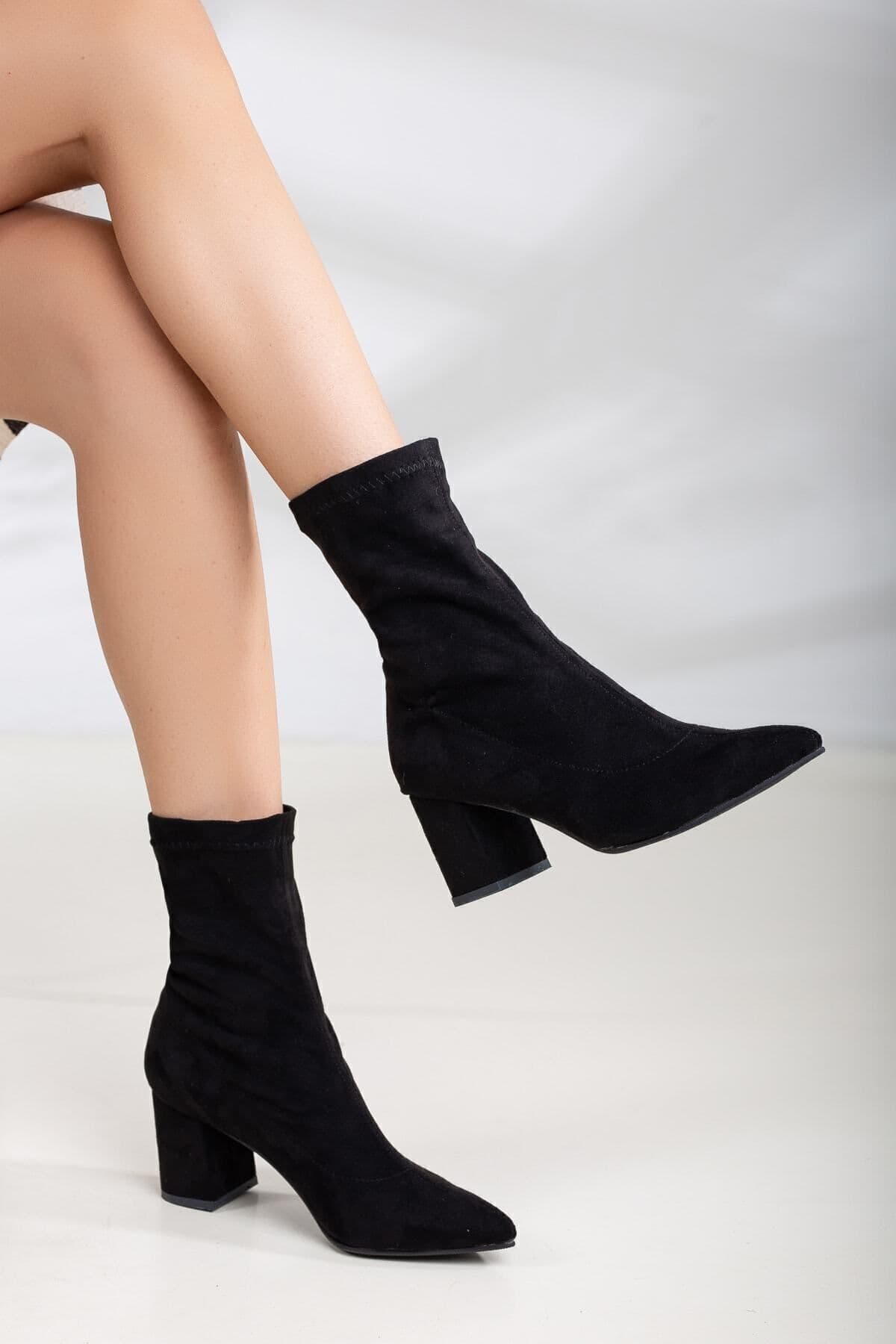 بوت زنانه SUENO SHOES استرچ سوئد مشکی پاشنه 7 سانتیمتری بوت زنانه SUENO SHOES استرچ سوئد مشکی پاشنه 7 سانتیمتری