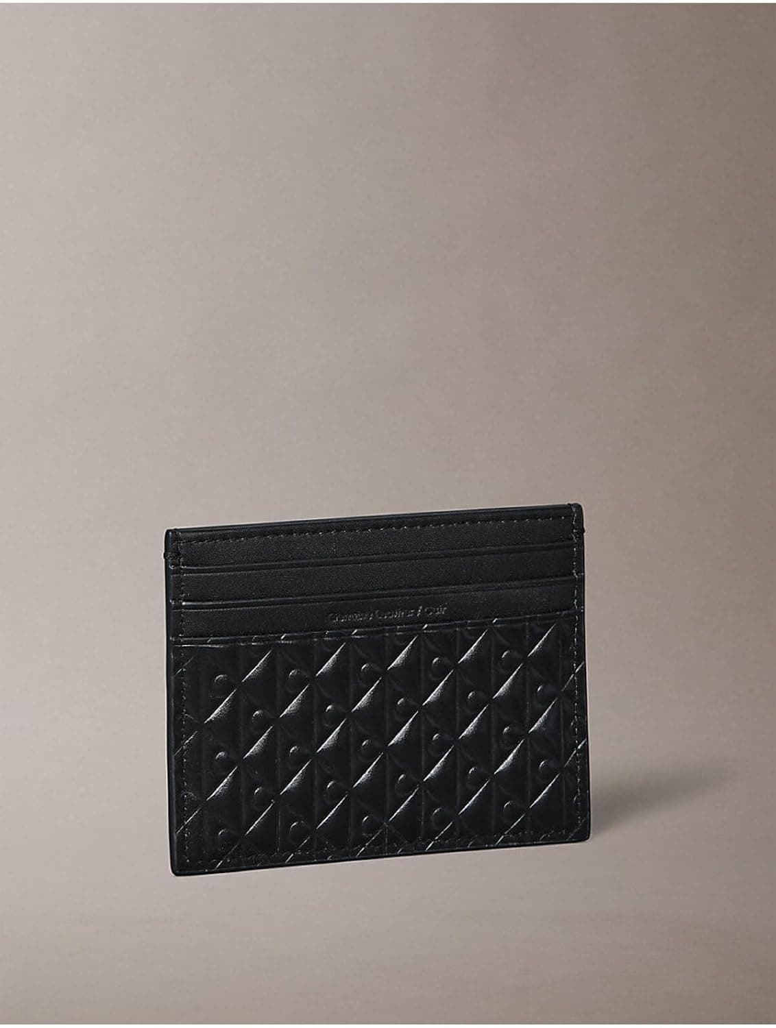 کارتخوان یونیسکس Calvin Klein مشکی با لوگوی برجسته Small مدل LV04D1128G کارتخوان یونیسکس Calvin Klein مشکی با لوگوی برجسته Small مدل LV04D1128G