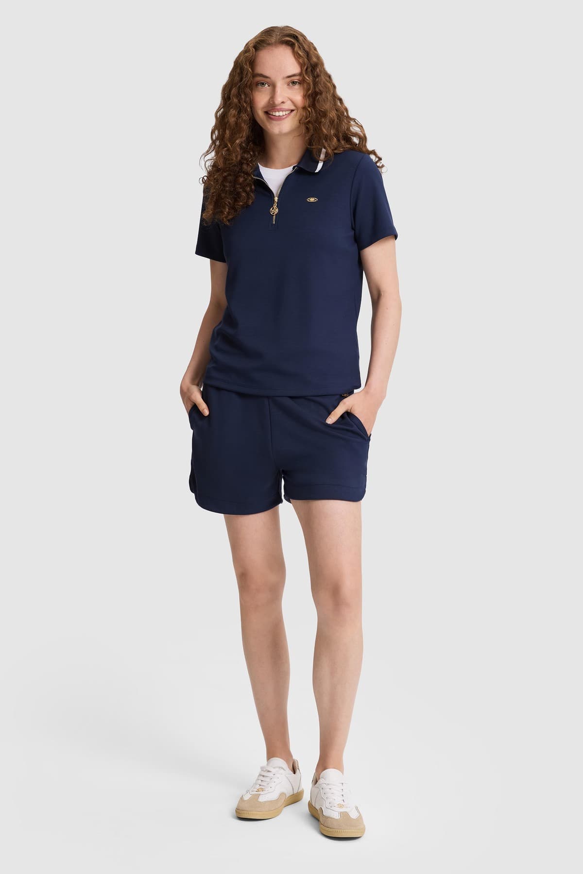 تیشرت زنانه U.S. Polo Assn. یقه پولو نیمزیپ سرمهای مدل 50323481-VR033 تیشرت زنانه U.S. Polo Assn. یقه پولو نیمزیپ سرمهای مدل 50323481-VR033