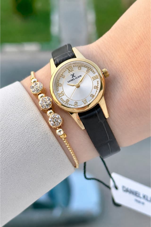 ساعت مچی زنانه Daniel Klein با بند مشکی و کاسه طلایی 25 mm ساعت مچی زنانه Daniel Klein با بند مشکی و کاسه طلایی 25 mm