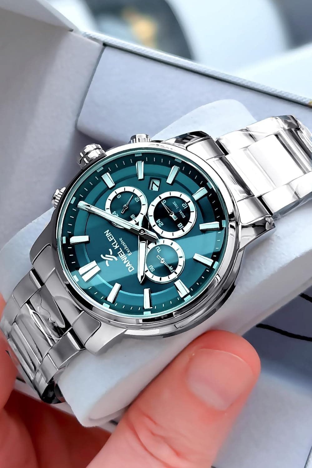 ساعت مردانه Daniel Klein ضدآب 3 ATM بند فولادی نقرهای پترولی مدل DKE2051C5 ساعت مردانه Daniel Klein ضدآب 3 ATM بند فولادی نقرهای پترولی مدل DKE2051C5