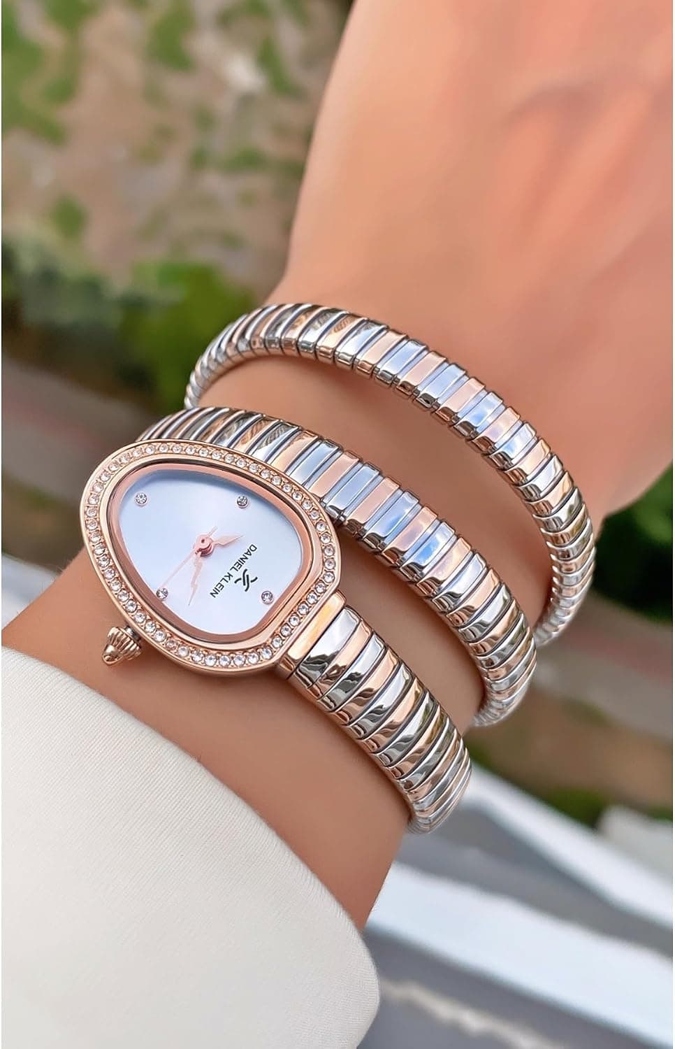 ساعت مچی زنانه Daniel Klein رنگ نقرهای رز بند طرح مار گارانتی 2 ساله ساعت مچی زنانه Daniel Klein رنگ نقرهای رز بند طرح مار گارانتی 2 ساله