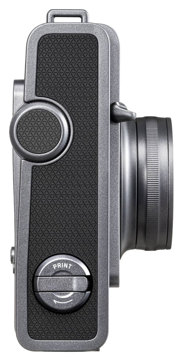 دوربین فوری Fujifilm مشکی با چاپگر هیبرید مدل Instax Wide Evo دوربین فوری Fujifilm مشکی با چاپگر هیبرید مدل Instax Wide Evo