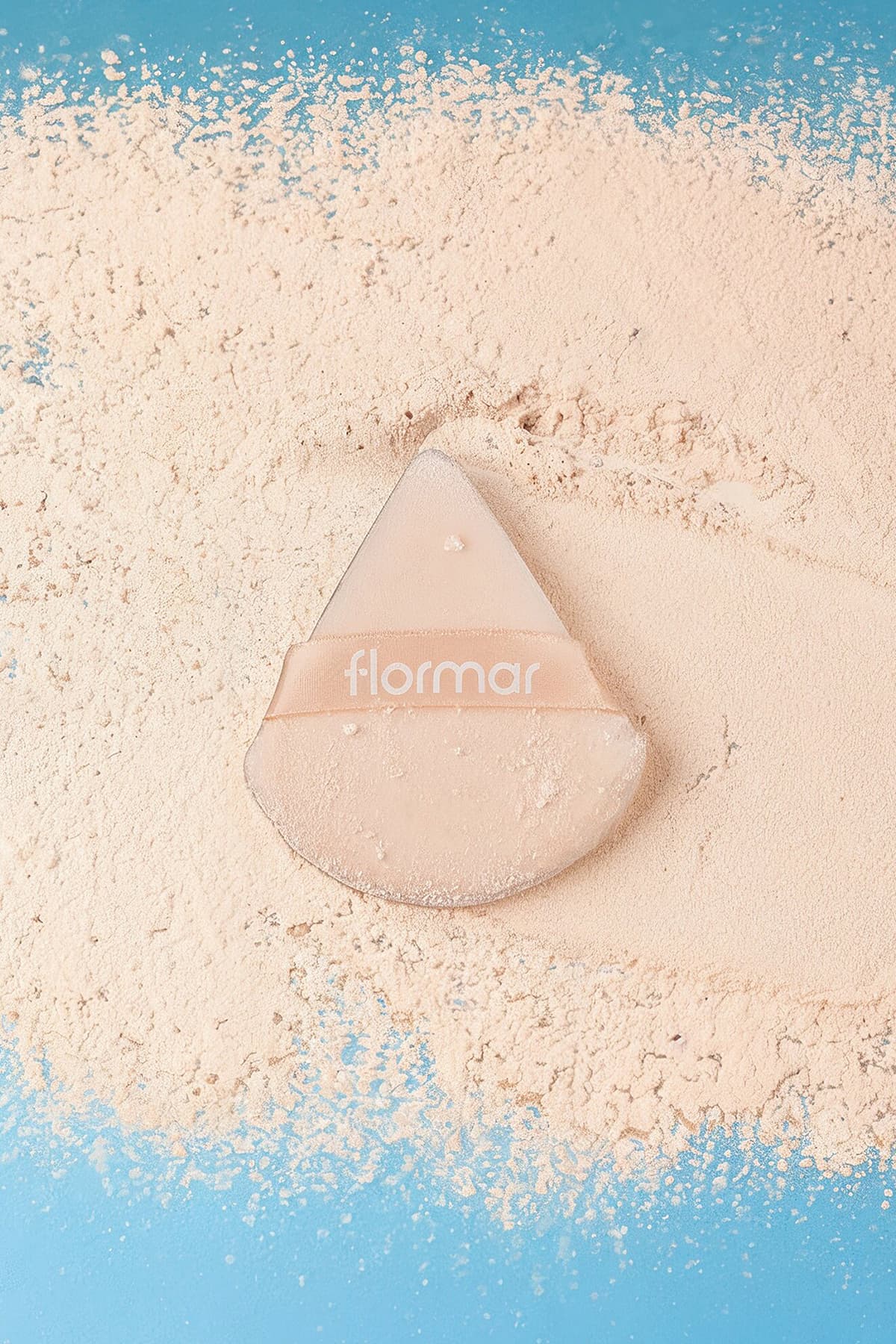 اسفنج پودر فشرده مثلثی Flormar با بافت نرم و پنبهای اسفنج پودر فشرده مثلثی Flormar با بافت نرم و پنبهای