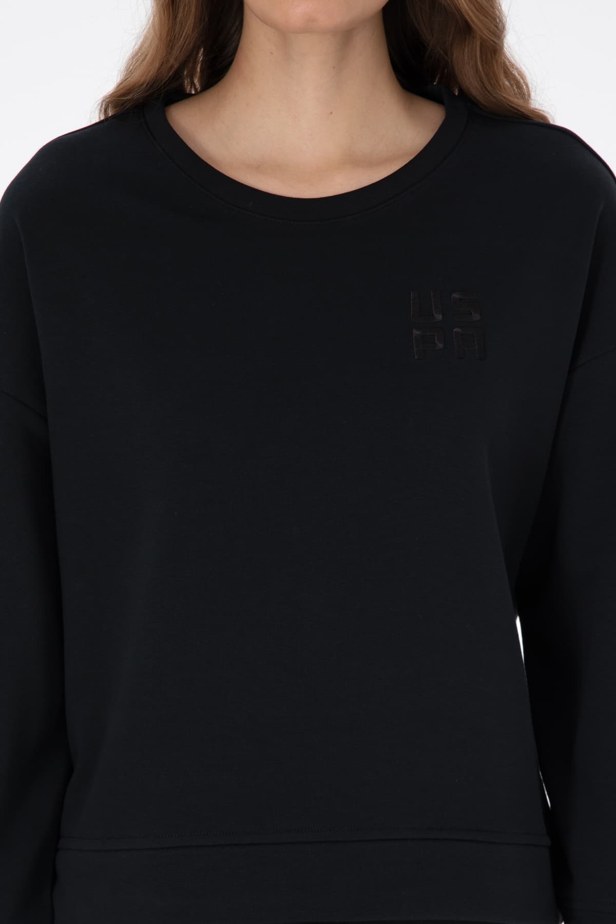 سوئیشرت زنانه U.S. Polo Assn. مشکی یقه گرد ساده مدل 50313565-VR046 سوئیشرت زنانه U.S. Polo Assn. مشکی یقه گرد ساده مدل 50313565-VR046