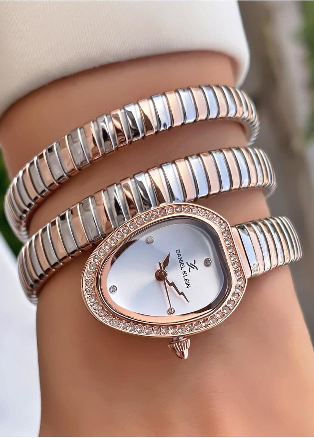ساعت مچی زنانه Daniel Klein رنگ نقرهای رز بند طرح مار گارانتی 2 ساله ساعت مچی زنانه Daniel Klein رنگ نقرهای رز بند طرح مار گارانتی 2 ساله
