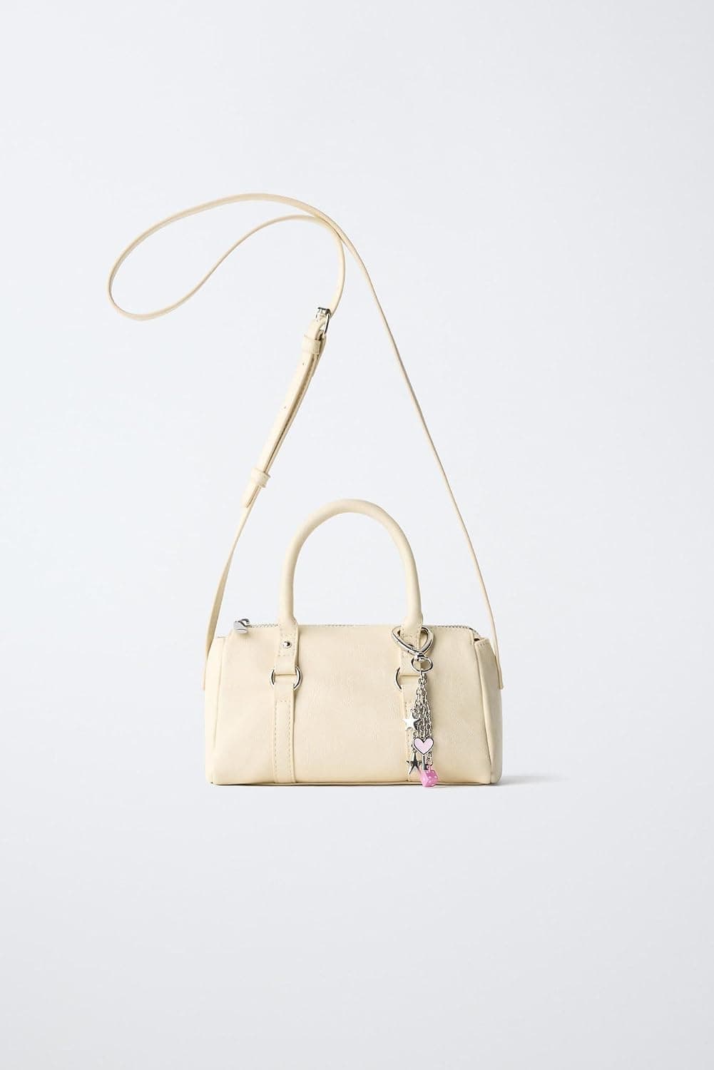 کیف دخترانه Zara با آویز تزئینی و بند ضربدری کیف دخترانه Zara با آویز تزئینی و بند ضربدری