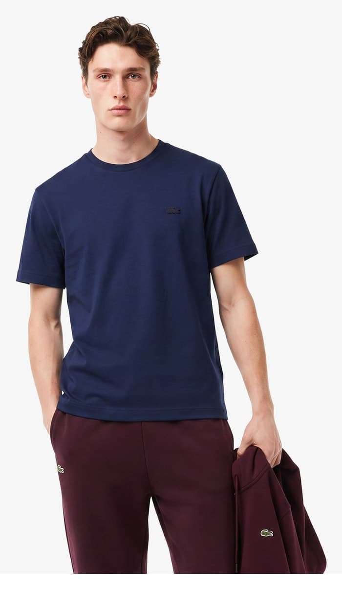 تیشرت مردانه Lacoste فیت اورسایز یقه گرد سرمهای تیشرت مردانه Lacoste فیت اورسایز یقه گرد سرمهای