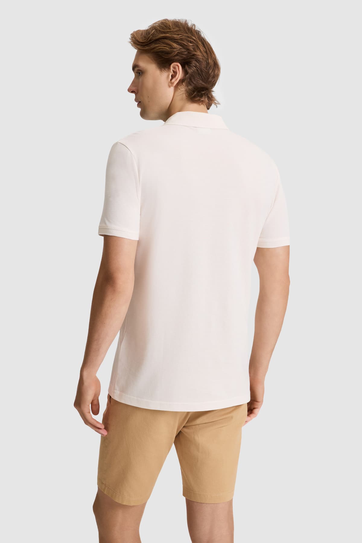 تیشرت مردانه یقه پولو U.S. Polo Assn. کرم ساده با فیت معمولی مدل 50326972-VR071 تیشرت مردانه یقه پولو U.S. Polo Assn. کرم ساده با فیت معمولی مدل 50326972-VR071
