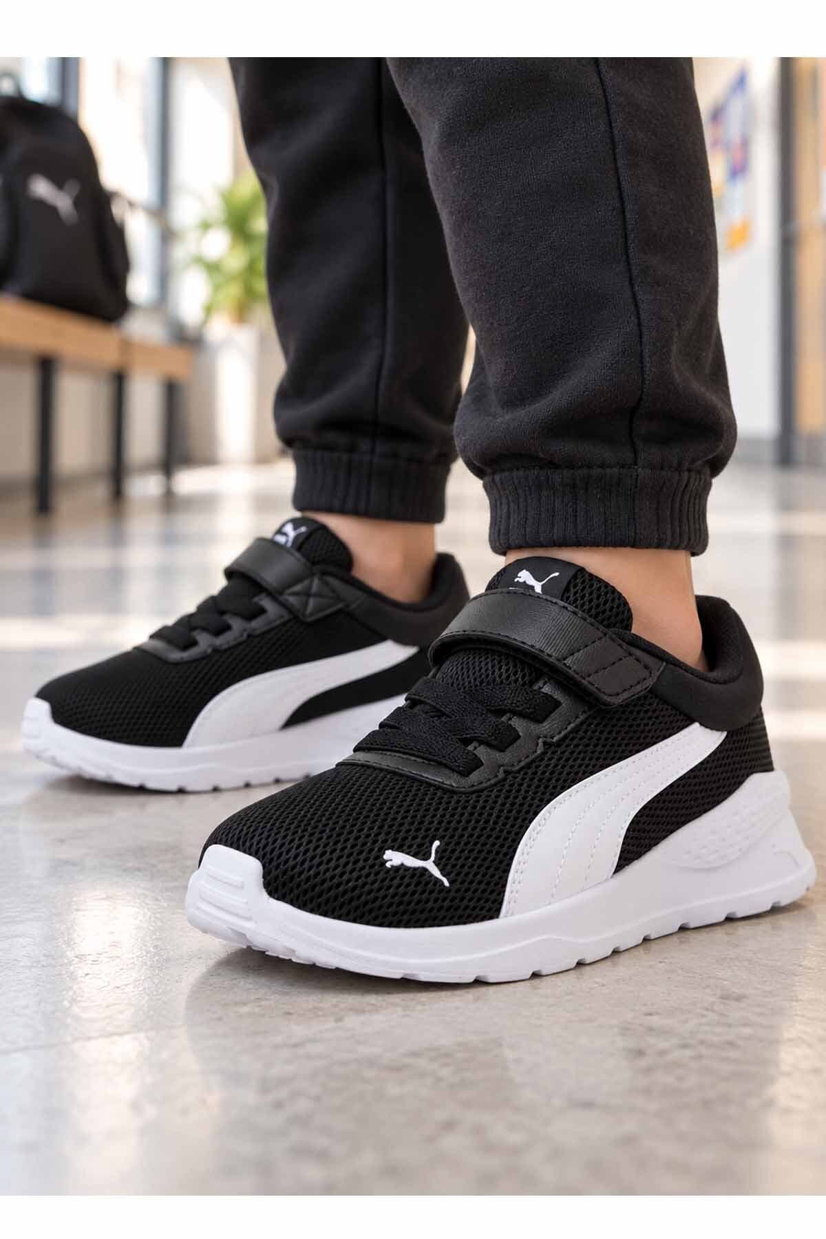 کفش ورزشی بچگانه Puma مشکی سفید روزمره با بند چسبی کفش ورزشی بچگانه Puma مشکی سفید روزمره با بند چسبی