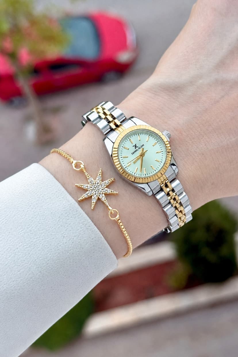 ساعت مچی زنانه Daniel Klein صفحه سبز آبی بند طلایی خاکستری 22.5mm و دستبند ساعت مچی زنانه Daniel Klein صفحه سبز آبی بند طلایی خاکستری 22.5mm و دستبند