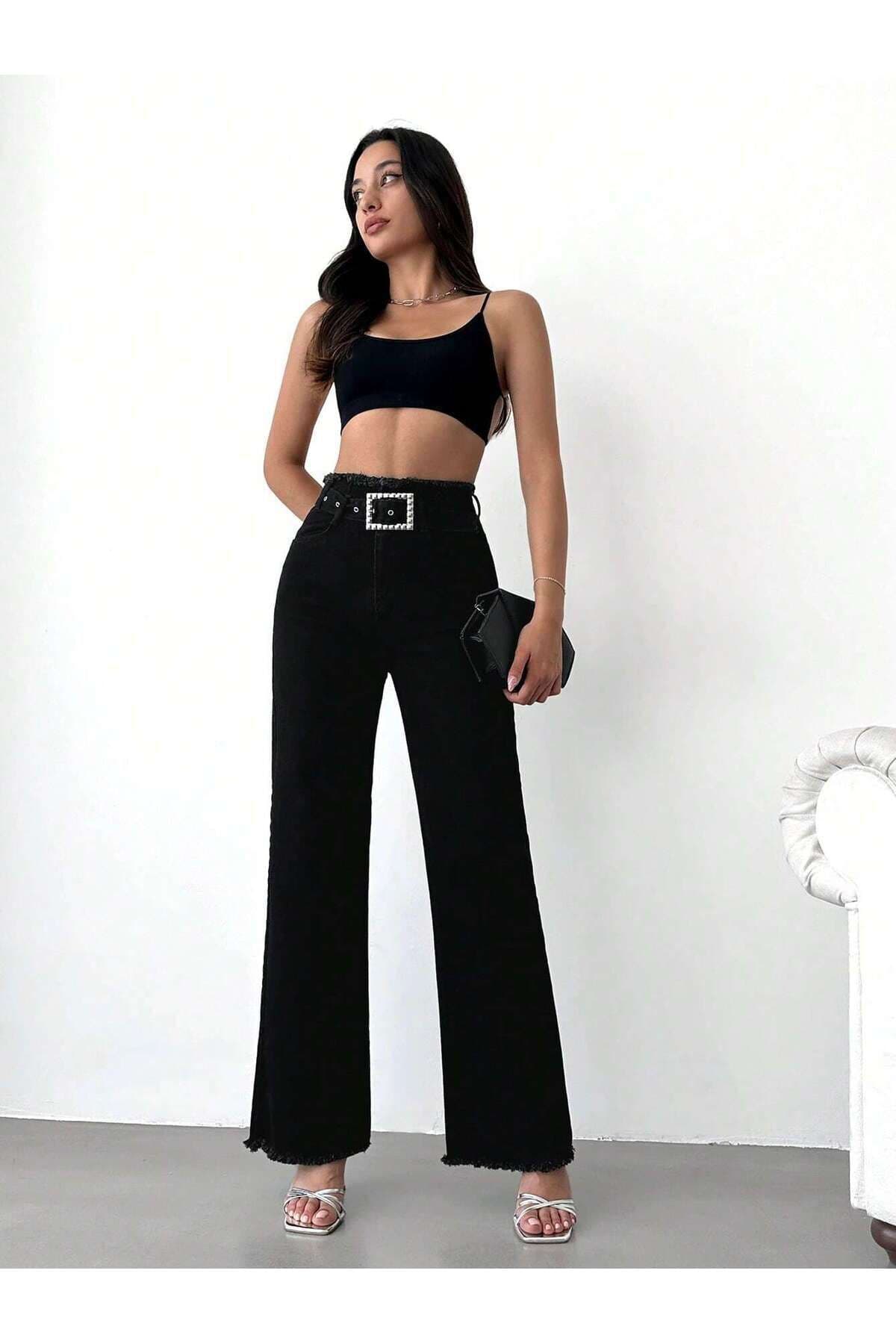شلوار جین پالازو زنانه Swet Shop Jeans مشکی کمر بلند کشی با کمربند سگکدار و لبه ریشریش شلوار جین پالازو زنانه Swet Shop Jeans مشکی کمر بلند کشی با کمربند سگکدار و لبه ریشریش