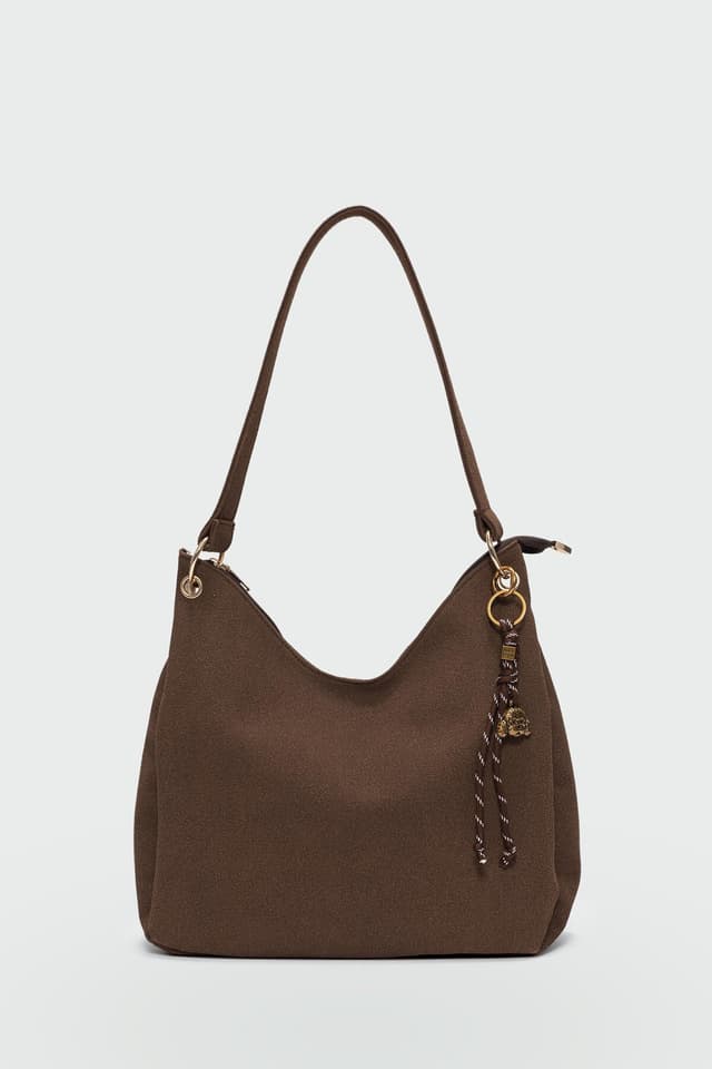 کیف دوشی زنانه Shule Bags با آویز قهوهای مدل Calico کیف دوشی زنانه Shule Bags با آویز قهوهای مدل Calico
