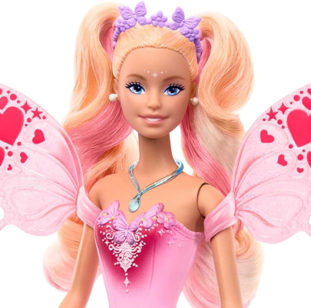 عروسک فانتزی Barbie با چوب جادویی و لوازم جانبی، بالها و لباس تغییررنگدهنده عروسک فانتزی Barbie با چوب جادویی و لوازم جانبی، بالها و لباس تغییررنگدهنده