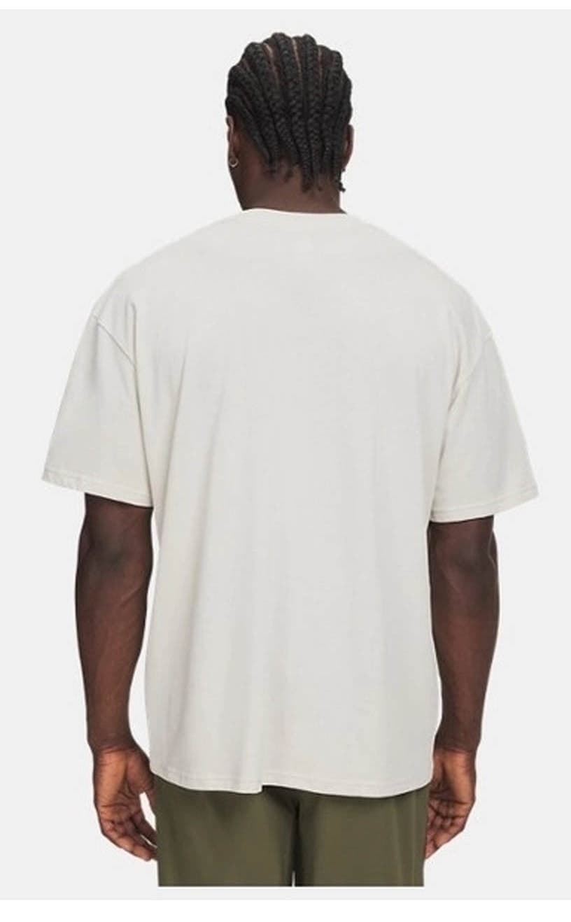 تیشرت مردانه Under Armour سفید با لوگوی متال وزن سنگین مدل 6013618-110 تیشرت مردانه Under Armour سفید با لوگوی متال وزن سنگین مدل 6013618-110