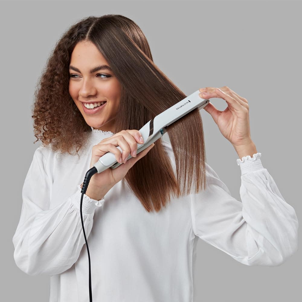 اتو مو Remington Hydraluxe Pro با فناوری مه Hydracare و روکش سرامیکی مدل S9001 اتو مو Remington Hydraluxe Pro با فناوری مه Hydracare و روکش سرامیکی مدل S9001