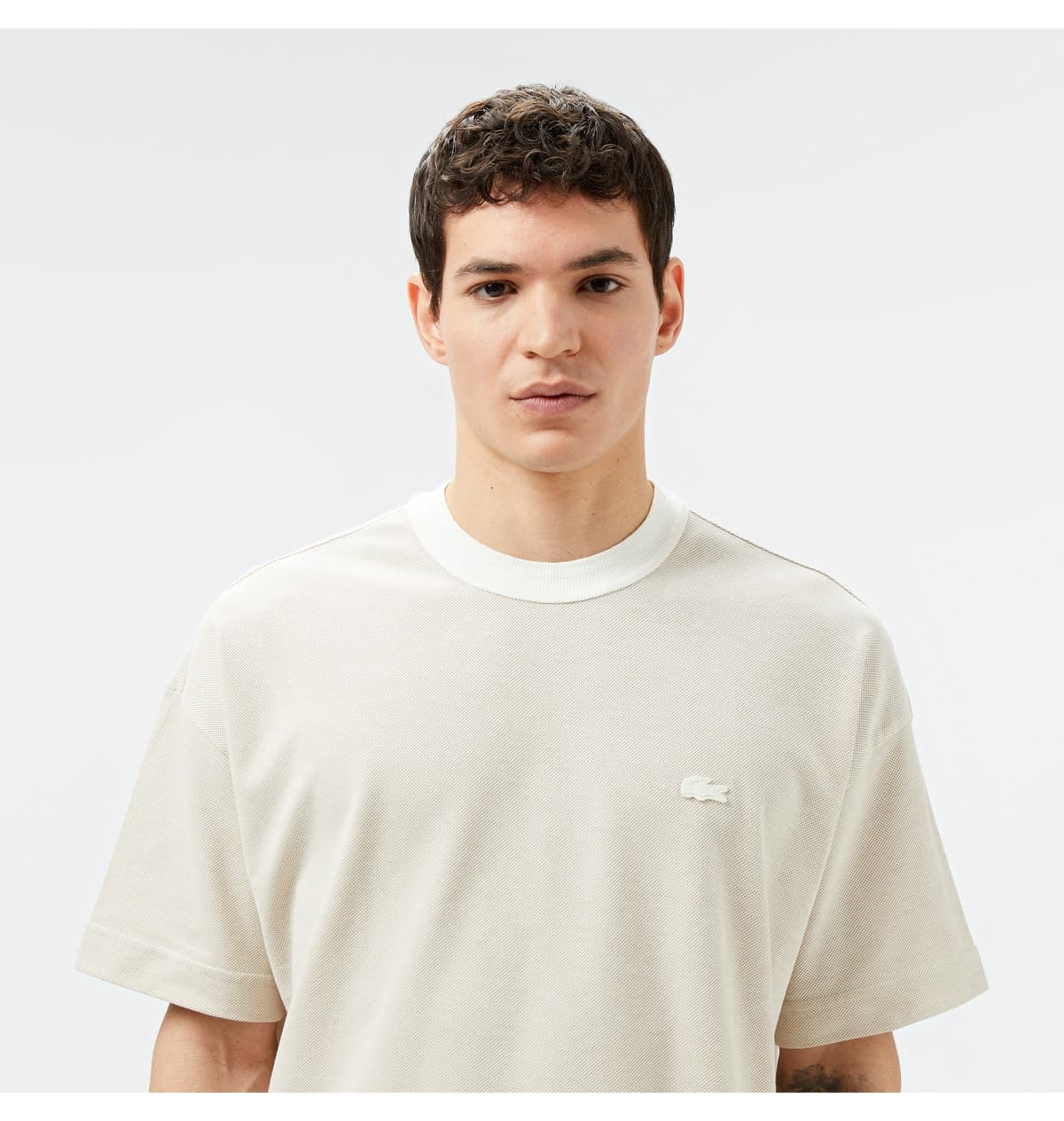 تیشرت مردانه Lacoste فیت اورسایز یقه گرد کرم تیشرت مردانه Lacoste فیت اورسایز یقه گرد کرم