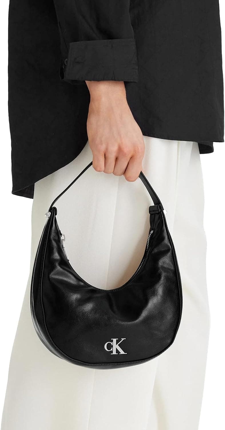 کیف دوشی زنانه Calvin Klein مدل BUCKLE SMALL BAG مشکی OS کیف دوشی زنانه Calvin Klein مدل BUCKLE SMALL BAG مشکی OS
