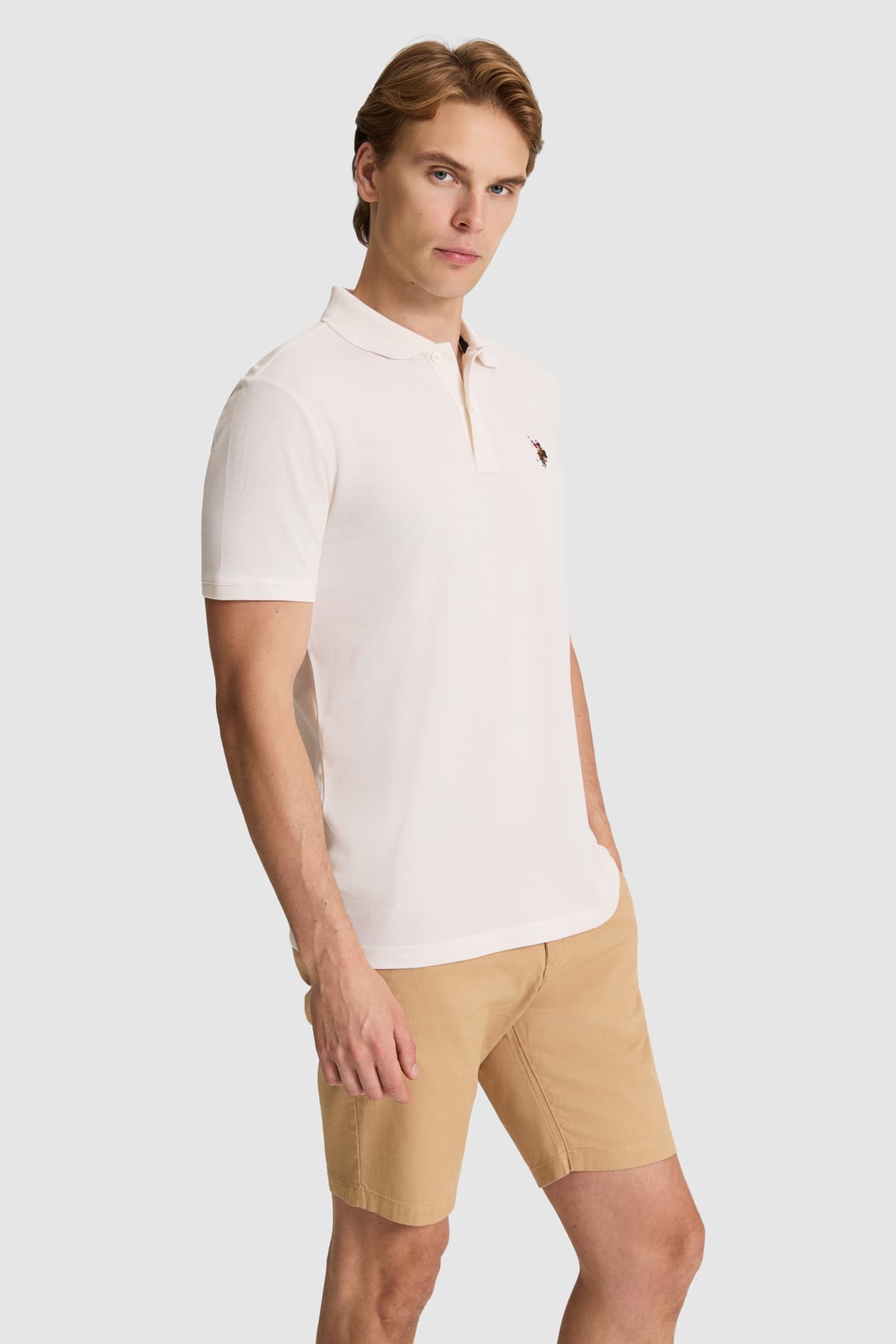 تیشرت مردانه یقه پولو U.S. Polo Assn. کرم ساده با فیت معمولی مدل 50326972-VR071 تیشرت مردانه یقه پولو U.S. Polo Assn. کرم ساده با فیت معمولی مدل 50326972-VR071