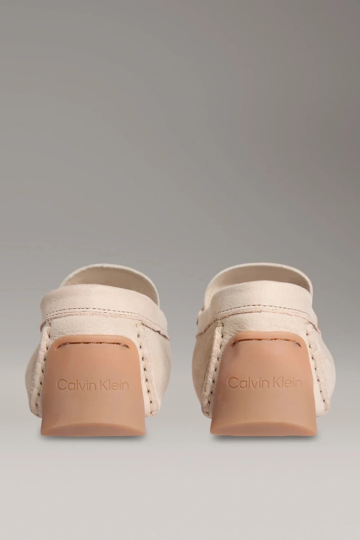 کفش لوفر مردانه Calvin Klein نابوک بژ Penny Driver مدل HM0HM01866-ACE کفش لوفر مردانه Calvin Klein نابوک بژ Penny Driver مدل HM0HM01866-ACE