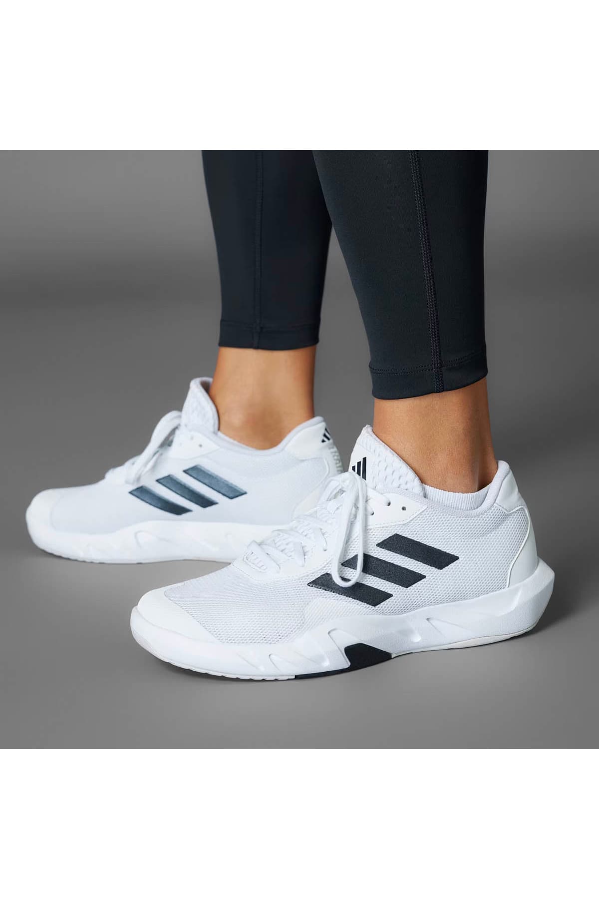 کفش دویدن و تمرین زنانه adidas Amplimove سفید مشکی مدل IF0958 کفش دویدن و تمرین زنانه adidas Amplimove سفید مشکی مدل IF0958