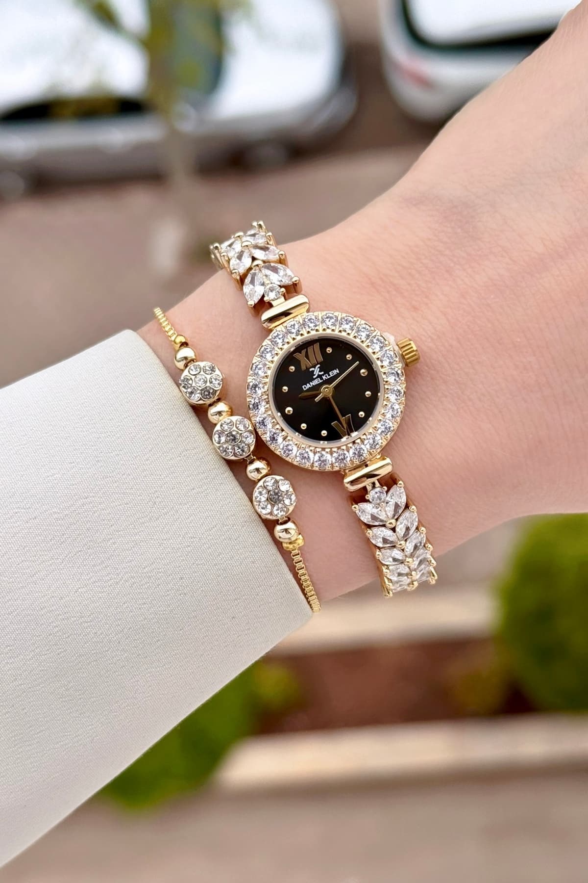 ساعت مچی زنانه Daniel Klein صفحه مشکی بند مشکی طلایی 22,5 mm مدل عروس ساعت مچی زنانه Daniel Klein صفحه مشکی بند مشکی طلایی 22,5 mm مدل عروس