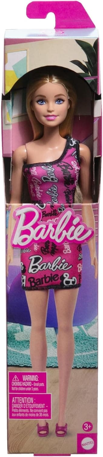 عروسک مد Barbie با موهای بلوند صاف، لباس صورتی جداشدنی و کفشهای لوگودار عروسک مد Barbie با موهای بلوند صاف، لباس صورتی جداشدنی و کفشهای لوگودار