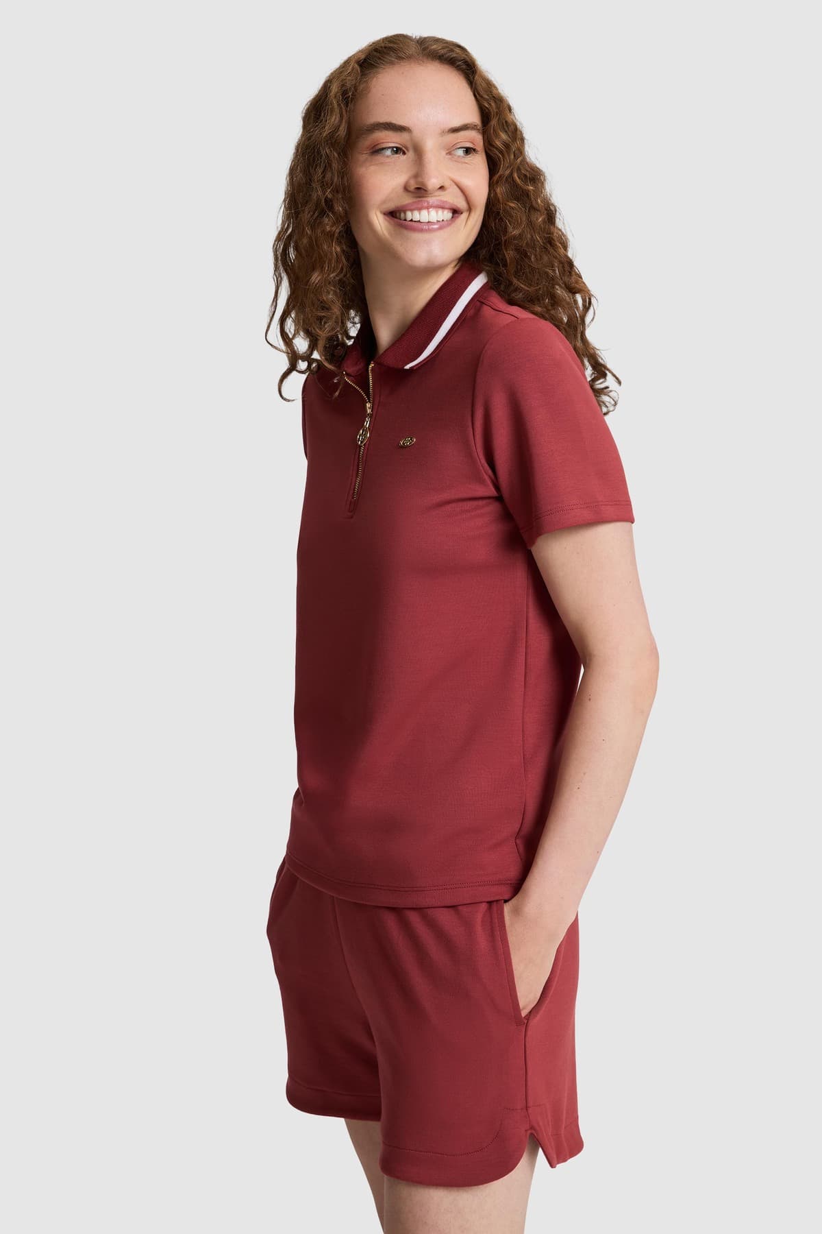 تیشرت زنانه یقه پولو U.S. Polo Assn. نیمزیپ زرشکی مدل 50323481-VR223 تیشرت زنانه یقه پولو U.S. Polo Assn. نیمزیپ زرشکی مدل 50323481-VR223