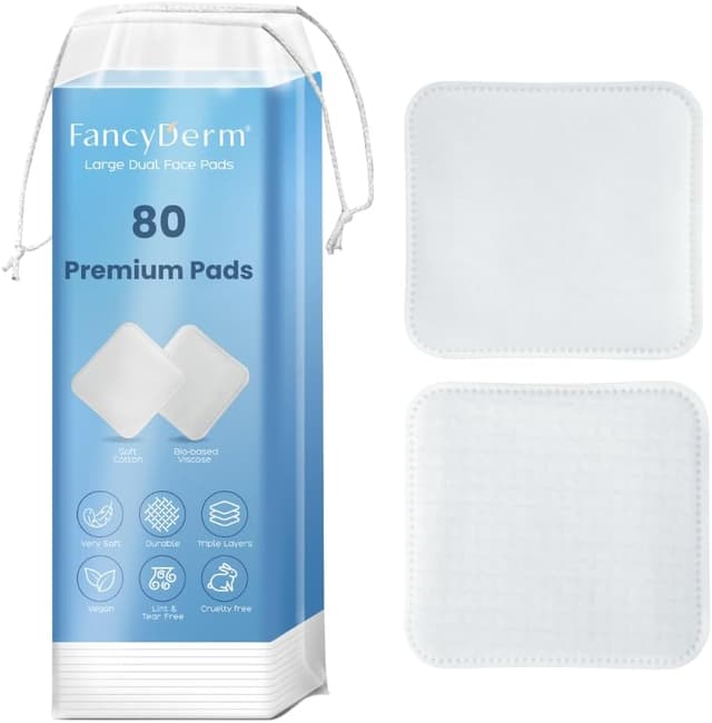پد پنبهای پاککننده آرایش و تونر صورت FancyDerm دوطرفه بزرگ سهلایه 80 عددی پد پنبهای پاککننده آرایش و تونر صورت FancyDerm دوطرفه بزرگ سهلایه 80 عددی