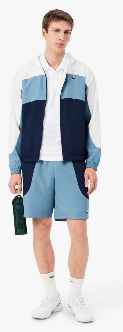 پولو مردانه Lacoste SPORT فیت معمولی رنگبلوک سفید پولو مردانه Lacoste SPORT فیت معمولی رنگبلوک سفید