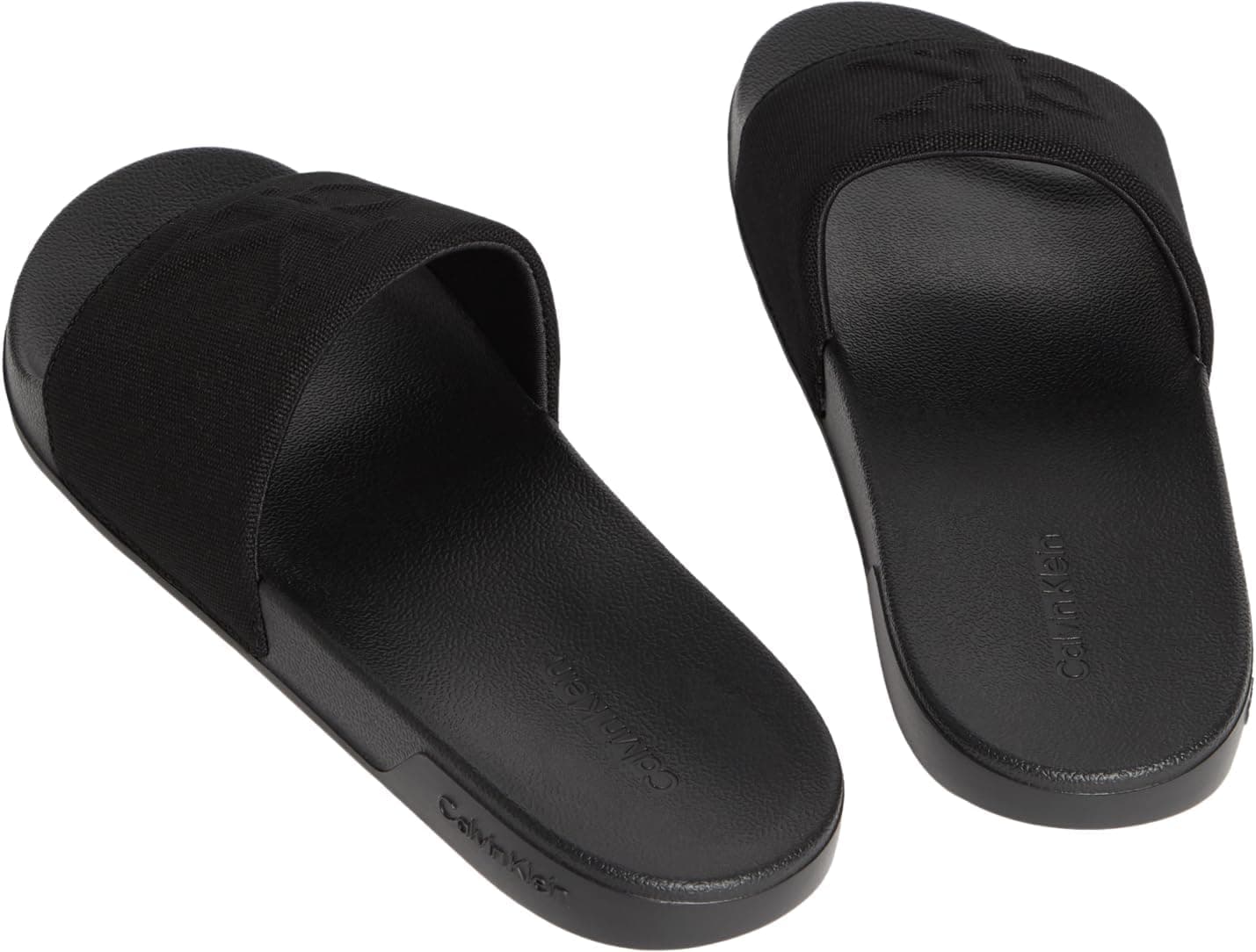 دمپایی مردانه Calvin Klein مدل ESS SLIDE HF MONOGRA دمپایی مردانه Calvin Klein مدل ESS SLIDE HF MONOGRA